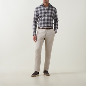 Model wearing Eleventy dark grey large check cotton casual shirt, styled with stone chinos, brown belt and dark navy espadrilles