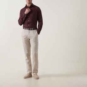 Model wearing Eleventy Casual Shirt in Barolo e Sabbia with geometric print, styled with stone linen trousers and suede desert boots.
