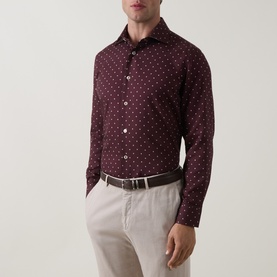Model wearing Eleventy casual shirt in Barolo e Sabbia, small ditsy print, styled with stone chinos and brown leather belt