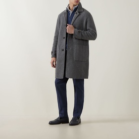 Model wearing Eleventy grigio medio melange wool coat, styled with navy trousers and blue layered top, knee-length silhouette
