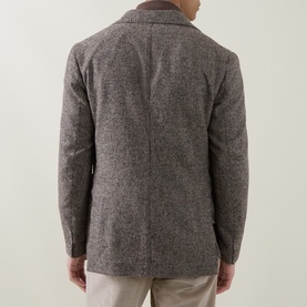 Model wearing Eleventy Check Single-Breasted Blazer in brown alpaca wool blend, back view showing double vent and check pattern.