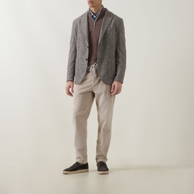 Model wearing Eleventy Check Single-Breasted Blazer in brown, styled with a burgundy jumper, blue shirt, and stone chinos.