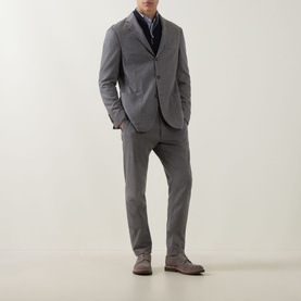 Model wearing Eleventy Brushed Single-Breasted Blazer in grey wool-cashmere, styled with matching grey trousers and brown suede shoes.