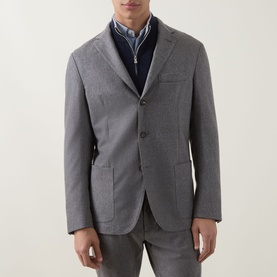 Model wearing Eleventy Brushed Single-Breasted Blazer in grey, styled over a navy zip-neck jumper and striped shirt.