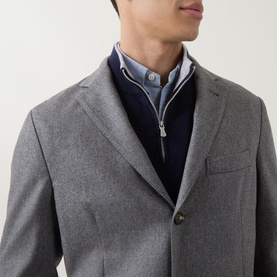 Model wearing Eleventy Brushed Single-Breasted Blazer in grey wool-cashmere, styled over a navy zip-neck jumper and blue shirt.