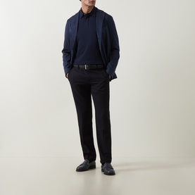 Model wearing Eleventy Blu Nuovo cotton polo, styled with navy blazer, dark trousers and black leather shoes