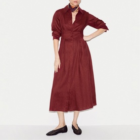 Model wearing burgundy midi shirt dress with belted waist and three-quarter sleeves, styled with black loafers and printed scarf