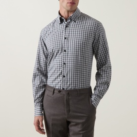 Model wearing Slowear mid grey gingham check cotton casual shirt with button-down collar, styled with grey trousers