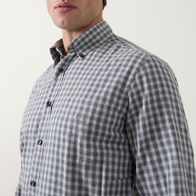 Model wearing Slowear mid grey cotton gingham check casual shirt with button-down collar, long sleeves visible