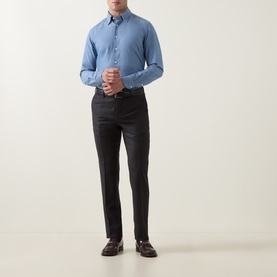 Model wearing Slowear Solid Single-Cuff Shirt in light blue with kent collar, styled with dark trousers and burgundy loafers.