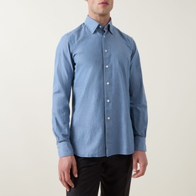 Model wearing Slowear Solid Single-Cuff Shirt in light blue cotton, featuring Kent collar, button fastening and long sleeves, styled with dark