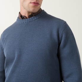 Model wearing Slowear Rib Knit Sweater in blue, crew neck with ribbed trims, styled with a brown collared shirt underneath.