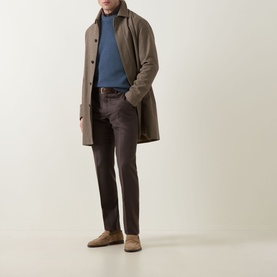 Model wearing Slowear Blue Rib Knit Crew Neck Sweater, styled with taupe overcoat, dark trousers, and suede loafers.