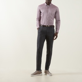 Model wearing Slowear grey wool-cashmere formal trousers, styled with a mauve shirt, brown belt and grey slip-on shoes.