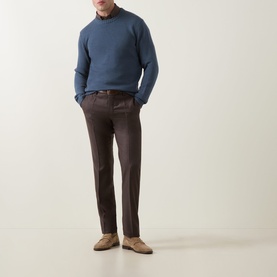 Model wearing Slowear Straight Leg Trousers in brown wool-cashmere, styled with a blue crewneck sweater and tan loafers.