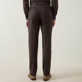 Model wearing Slowear Straight Leg Trousers in brown wool-cashmere, rear view showing pressed creases, belt loops and welt pockets, styled with tan