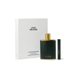 Victoria Beckham 21:50 R&ecirc;verie Eau de Parfum fragrance set with dark green bottle, gold cap, and travel spray pen beside white gift box