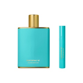 Victoria Beckham Portofino '97 fragrance set featuring turquoise eau de parfum bottle and matching travel spray with gold cap detailing