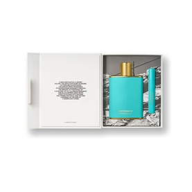 Victoria Beckham Beauty Fragrance Set in open gift box, featuring teal bottle with gold cap and matching travel-size rollerball