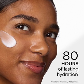 Model with Elizabeth Arden moisturiser applied to cheek, with 80 hours of lasting hydration claim visible