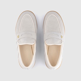 Adidas loafers in Wonder White suede, top-down view showing penny strap, gold logo detail and cream gum sole.