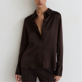 Model wearing Reiss grape burgundy satin shirt with classic collar and long sleeves, styled with matching wide-leg trousers