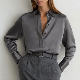Model wearing Reiss dark grey satin shirt with point collar, styled with grey tailored trousers and a black belt