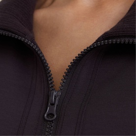 Model wearing Reiss grape burgundy zip-up jacket, close-up of dark zip and funnel neckline detail