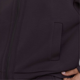 Reiss grape burgundy zip-up jacket close-up, showing tonal zip and side pocket detail on smooth fabric.