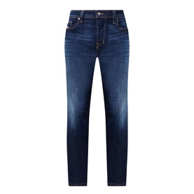 Diesel 3049 tapered jeans in dark blue denim with faded wash, five-pocket styling and subtle whiskering detail