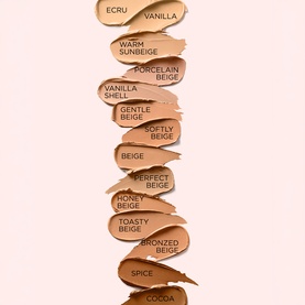 Elizabeth Arden Flawless Finish Sponge-On Cream Makeup shade swatches from Ecru to Cocoa, with Gentle Beige highlighted on pink background