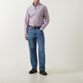Model wearing Gant Deep Grape Wine regular fit cotton casual shirt with blue jeans and brown loafers.