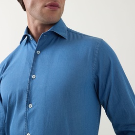 Model wearing Canali light blue cotton-linen casual shirt, close-up detail showing classic collar and button placket