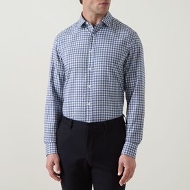 Model wearing Canali Check Casual Shirt in navy, long sleeves, button-down collar, chest pocket, styled with dark trousers.