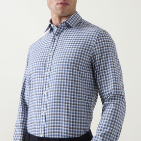 Model wearing Canali Check Casual Shirt in navy, featuring long sleeves, button-down collar and multi-tone check print, styled with dark trousers.