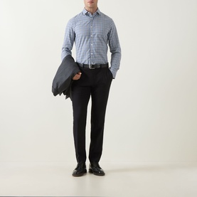 Model wearing Canali Check Casual Shirt in navy, long sleeves, button front, styled with black trousers and loafers, carrying dark blazer.