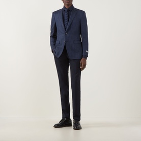 Model wearing Canali Flannel Herringbone Shirt in navy, styled with a matching navy suit, tie, and black leather dress shoes.