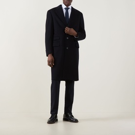 Model wearing Canali Classic Single-Breasted Overcoat in navy wool-cashmere, styled with dark trousers, blue tie and black leather shoes.