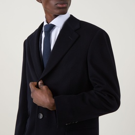 Model wearing Canali Classic Single-Breasted Overcoat in navy wool-cashmere blend with notch lapel, styled with white shirt and navy tie.