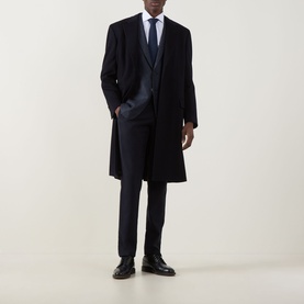 Model wearing Canali Classic Single-Breasted Overcoat in navy wool-cashmere, styled with dark suit, white shirt, and black leather shoes.