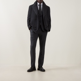 Model wearing Canali Double-Breasted Peacoat in charcoal wool-cashmere, styled with matching trousers, white shirt, black tie and leather shoes.