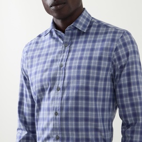 Model wearing Canali blue cotton check casual shirt, close-up showing collar and button placket detail