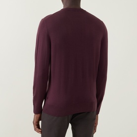 Model wearing Canali Fine-Knit Sweater in burgundy, crew neck, long sleeves, ribbed trims, rear view, styled with dark trousers.