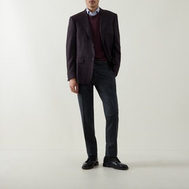 Model wearing Canali charcoal wool formal trousers, styled with a burgundy blazer, knit sweater, light blue shirt and black leather shoes.