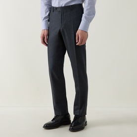 Model wearing Canali charcoal wool formal trousers, styled with a light blue shirt and black leather Oxford shoes.