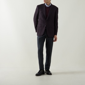 Model wearing Canali charcoal wool formal trousers, styled with a burgundy blazer, v-neck jumper and black leather shoes.