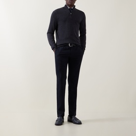 Model wearing Canali charcoal wool half zip jumper, styled with dark trousers, black belt and loafers.
