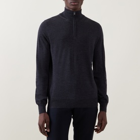 Model wearing Canali charcoal wool half-zip jumper with ribbed cuffs and hem, styled with dark trousers.