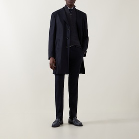 Model wearing Canali charcoal wool half zip, styled with navy overcoat, tailored trousers and dark leather Oxford shoes.