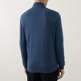 Model wearing Canali blue wool half zip jumper, rear view showing clean knit finish and long sleeves